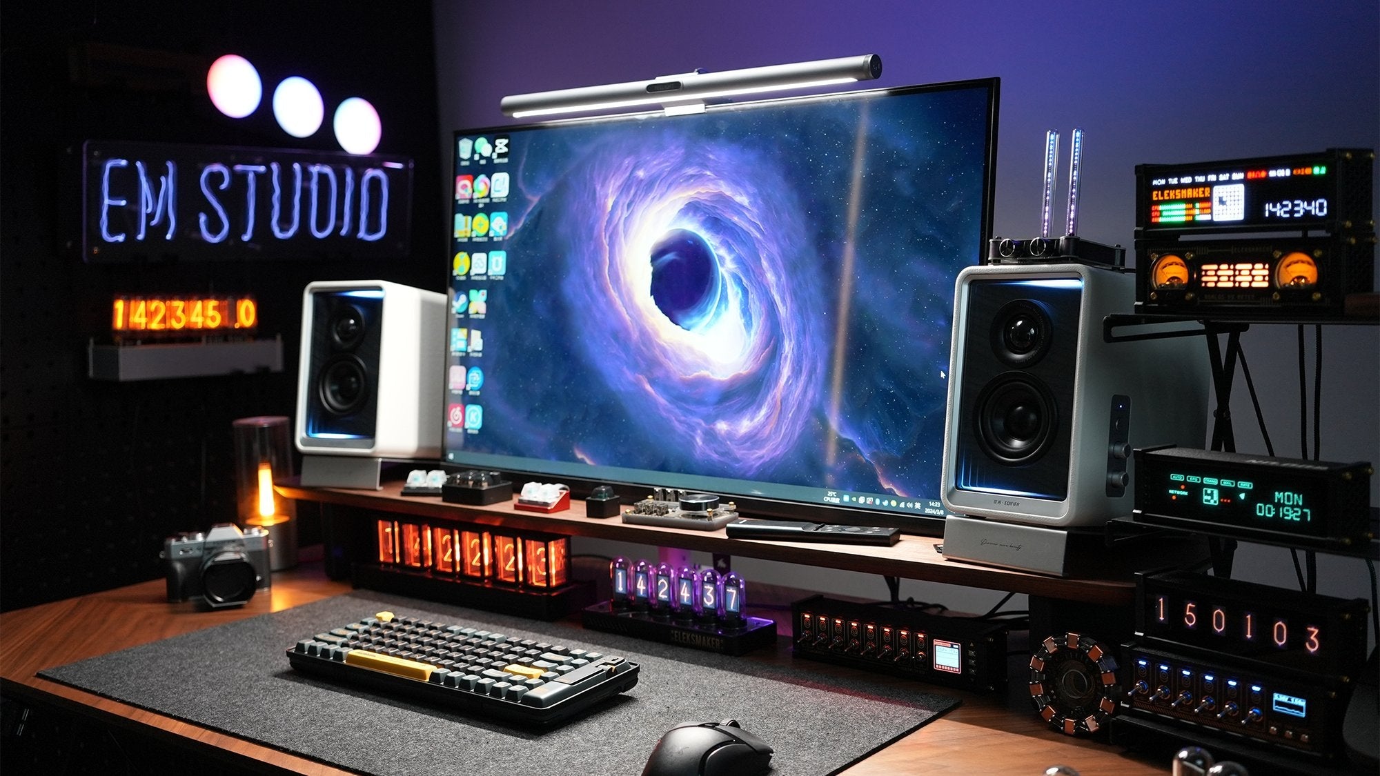 EleksMaker desktop setup with clocks, displays, and spectrum hardware